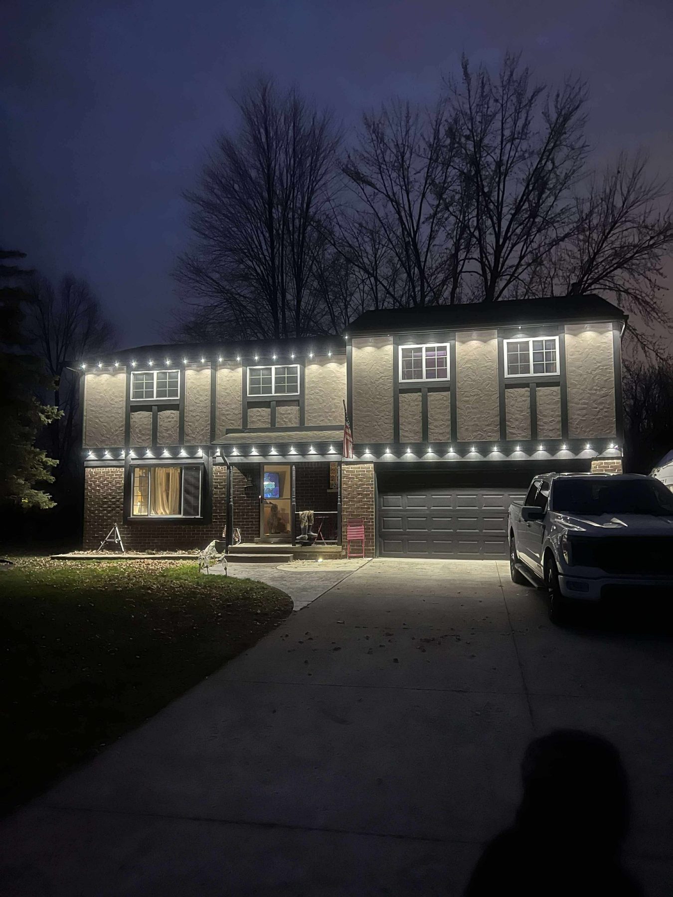 Home illuminated with permanent outdoor lights